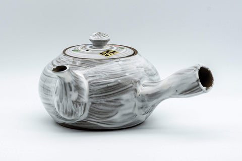 Tezumi — Floral brush-glazed kyusu teapot, side view with the spout to the right