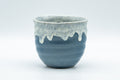 Japanese Teacup - Steel Blue Yunomi with White Drip Glaze - 180ml - front view of the steel blue cup with white drip glaze around the lip