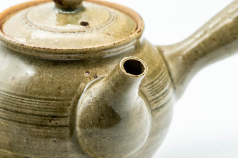 Tezumi — Japanese Tea Set - Speckled Olive Green Kyusu with 5 Yunomi - 350ml — the teapot and cups arranged together