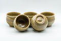 Tezumi — Japanese Tea Set - Speckled Olive Green Kyusu with 5 Yunomi - 350ml — closeup of a single piece