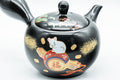 Japanese Kyusu - 盛山窯 Year of the Rat, Black Kurodei Tokoname-yaki Teapot - 370ml - overhead view showing the lid and painted decoration