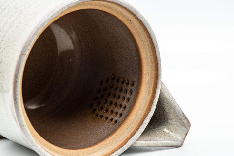 Japanese Kyusu - 萩焼 Houhin-style Hagi-yaki Do-ake Teapot - 450ml - closeup of the cream-glazed interior showing the ceramic do-ake filter
