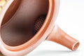 Japanese Tea Set - Tokoname-yaki Debeso Kyusu with 3 Yunomi - closeup of the red shudei clay teapot spout and body