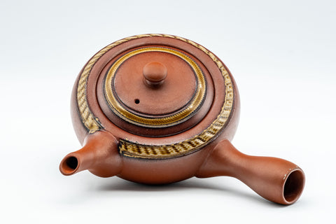 Japanese Tea Set - Tokoname-yaki Debeso Kyusu with 3 Yunomi - overhead view of the decorated teapot lid