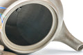 Tezumi — Orchid-decorated kyusu teapot with the lid removed, revealing the built-in mesh filter
