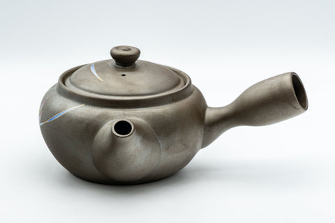 Tezumi — Orchid-decorated kyusu teapot, side view showing the painted orchid and spout