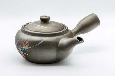 Tezumi — Orchid-decorated kyusu teapot, three-quarter view showing the lid and painted orchid