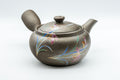 Tezumi — Orchid-decorated mesh-filtered kyusu teapot, side view of the grey clay teapot with side handle