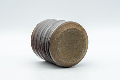 Japanese Teacup - Ribbed Tsutsu-gata Yunomi - 130ml - tilted view showing the unglazed foot