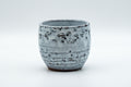 Japanese Teacup - White Glazed Spiral Yunomi - 125ml - front view showing the milky white spiral glaze