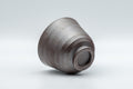 Japanese Teacup - Banko-yaki Senchawan - tilted on its side showing the ridged exterior and base
