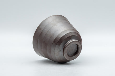 Japanese Teacup - Banko-yaki Senchawan - tilted on its side showing the ridged exterior and base