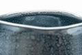 Japanese Matcha Bowl - 東山 Higashiyama Tenmoku Glazed Chawan with Bamboo Chasen Whisk and Chashaku Scoop - 500ml - closeup of the rim showing the oil-spot glaze texture