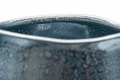 Japanese Matcha Bowl - 東山 Higashiyama Tenmoku Glazed Chawan with Bamboo Chasen Whisk and Chashaku Scoop - 500ml - closeup of the rim showing the oil-spot glaze texture