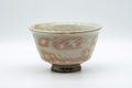 Japanese Matcha Bowl - Gohonte Hatazori-gata Kyo-yaki Chawan - 350ml - front view of the grey-glazed bowl with peach gohonte spots and floral relief