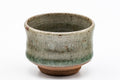 Japanese Teacup - Floral Dojimari-gata Guinomi - 50ml - three-quarter view showing the mottled green glaze
