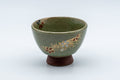 Japanese Teacup - Floral Celadon Sugi-nari Senchawan - side view showing the gilded cherry blossom decoration