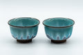 Japanese Teacups - Pair of Turquoise Drip-Glazed Agano-yaki Senchawan - 125ml - the pair of cups upright, front view of the turquoise drip glaze
