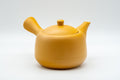 Japanese Tea Set - Yellow Debeso Kyusu with 5 Yunomi - side view of the teapot showing the handle and spout