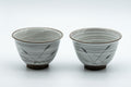 Japanese Teacups - Pair of White Glazed Yunomi with Long Grass Motifs - 100ml - front view of both teacups