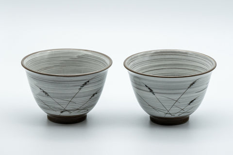 Japanese Teacups - Pair of White Glazed Yunomi with Long Grass Motifs - 100ml - front view of both teacups