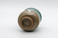 Japanese Teacup - Turquoise Glazed Agano-yaki Dojimari-gata Yunomi - 150ml - the teacup resting on its side showing the foot