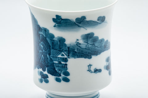 Japanese Teacups - Pair of 畑萬陶苑 Meoto Arita-gata Yunomi - closeup of a single teacup showing the village and distant mountains illustration