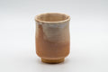 Japanese Teacup - Tsutsu-gata Hagi-yaki Yunomi - 210ml - front view of the tall teacup with crazed glaze fading from beige to warm orange