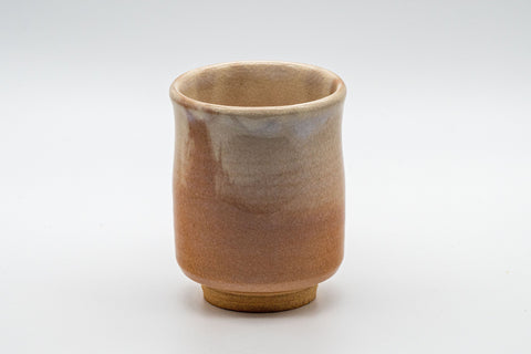 Japanese Teacup - Tsutsu-gata Hagi-yaki Yunomi - 210ml - front view of the tall teacup with crazed glaze fading from beige to warm orange