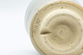 Tezumi — Japanese Teacup - Gohonte Tsutsu-gata Hagi-yaki Yunomi - 140ml — closeup of the glaze