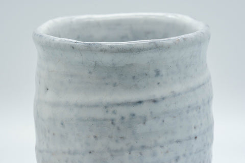 Japanese Teacups - Pair of Shino Glazed Stoneware Tsutsu-gata Meoto Yunomi - front view of one shino-glazed cup