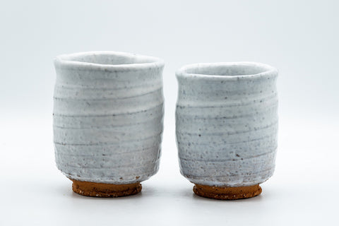 Japanese Teacups - Pair of Shino Glazed Stoneware Tsutsu-gata Meoto Yunomi - front view of the two tsutsu-gata yunomi