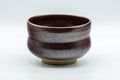 Japanese Matcha Bowl - Metallic Red Tenmoku Glazed Dojimara-gata Chawan - 400ml - side view of the metallic red tenmoku glazed matcha bowl