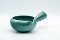 Japanese Yuzamashi - Turquoise Side-handled Water Cooler - 250ml - high-angle view of the interior and side handle