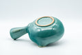 Japanese Yuzamashi - Turquoise Side-handled Water Cooler - 250ml - high-angle view of the base showing the maker's mark
