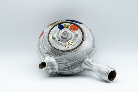 Tezumi — Floral brush-glazed kyusu teapot, side view from the handle side