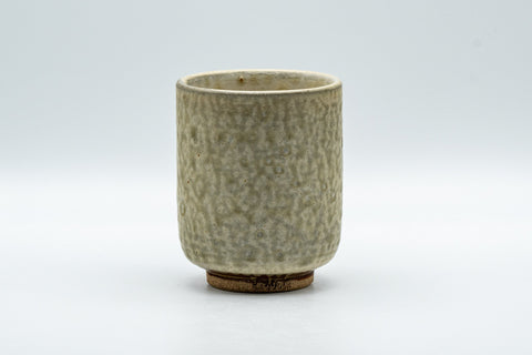 Japanese Teacup - Milky Green Koishiwara-yaki Yunomi - 180ml - front view of the cylindrical cup showing its textured milky green glaze