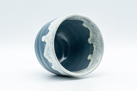 Japanese Teacup - Steel Blue Yunomi with White Drip Glaze - 180ml - the cup tipped on its side showing the glazed interior