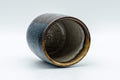 Tezumi — Japanese Teacup - Blue Yuteki Yunomi - 110ml — tipped on its side showing the glazed interior