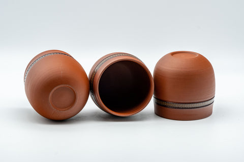 Japanese Tea Set - Tokoname-yaki Debeso Kyusu with 3 Yunomi - the three teacups tilted to show the interiors