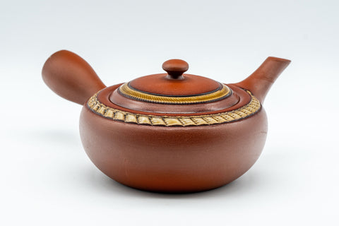 Japanese Tea Set - Tokoname-yaki Debeso Kyusu with 3 Yunomi - side view of the teapot showing the handle and spout