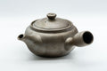 Tezumi — Orchid-decorated kyusu teapot, side view with the spout to the right