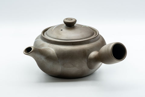 Tezumi — Orchid-decorated kyusu teapot, side view with the spout to the right
