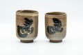 Japanese Teacups - Pair of Yukiyama Kiln Meoto Yunomi - the pair of brown-glazed teacups side by side showing the horse kanji