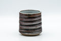 Japanese Teacup - Ribbed Tsutsu-gata Yunomi - 130ml - front view of the ribbed metallic-glazed teacup