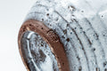 Japanese Teacup - White Glazed Spiral Yunomi - 125ml - angled closeup showing the exposed clay foot and spiral body