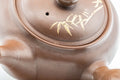 Tezumi — Japanese Kyusu - Brown and Gold Bamboo Teapot with Rubber Grip - 350ml — closeup of the base