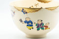 Japanese Matcha Bowl - 郎山 Wan-nari Kyo-yaki Chawan - 450ml - wraparound view of the figural decoration