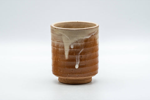 Japanese Teacup - Drip-Glazed Hagi-yaki Yunomi - 170ml - front view of the cylindrical teacup with a white drip glaze over crazed beige and orange