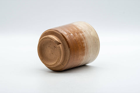 Japanese Teacup - Drip-Glazed Hagi-yaki Yunomi - 170ml - the teacup resting on its side showing the foot and underside